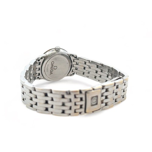 105 - Omega: A lady's 18ct white gold and diamond-set bracelet wristwatch. Case diameter approx 23mm, beze... 