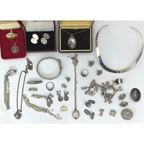 67 - Collection of silver jewellery items. Includes a silver torque necklace, marcasite and mother of pea... 