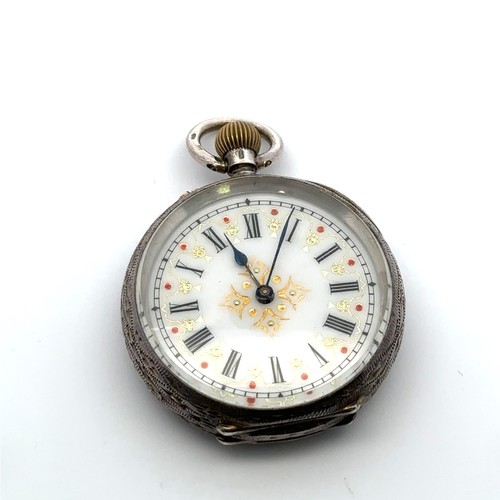 124 - A ladies 935 silver top wind pocket watch with decorated enamel dial.  Swiss three bears hallmarks. ... 