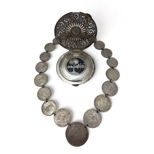 41 - A silver coin necklace made from 19th Century 800 and 900 silver coins such as US trade dollar, Kron... 