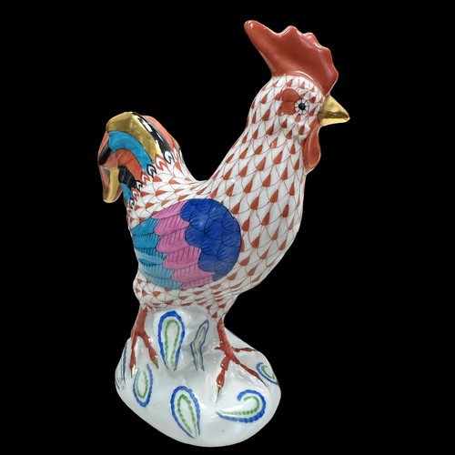 262 - Herend Hungary, a Herend handpainted porcelain Rooster with fishnet decoration 14cm, alongside a min... 