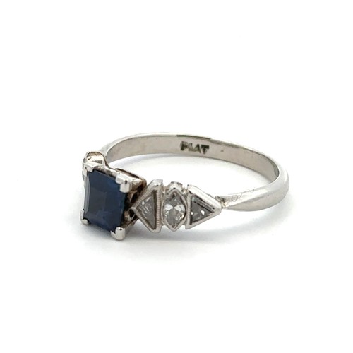 54 - A beautiful Art Deco sapphire and diamond ring, stamped as platinum. Set with a central square step ... 