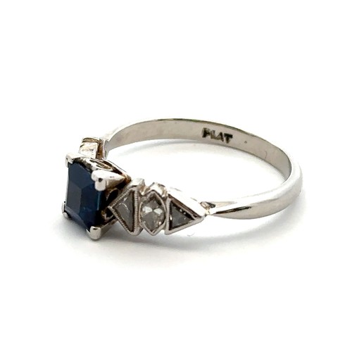 54 - A beautiful Art Deco sapphire and diamond ring, stamped as platinum. Set with a central square step ... 