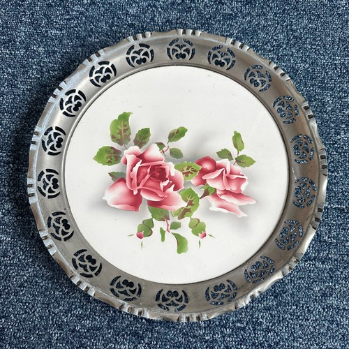 276 - Unusual porcelain plates with pewter rims, each with floral design, unmarked but almost certainly fr... 