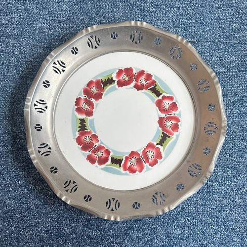 276 - Unusual porcelain plates with pewter rims, each with floral design, unmarked but almost certainly fr... 