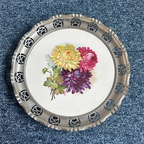 276 - Unusual porcelain plates with pewter rims, each with floral design, unmarked but almost certainly fr... 