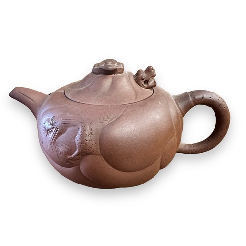 312 - Three Chinese teapots, Yixing Dragon teapot, Yixing & a Chicken shaped teapot. (3)