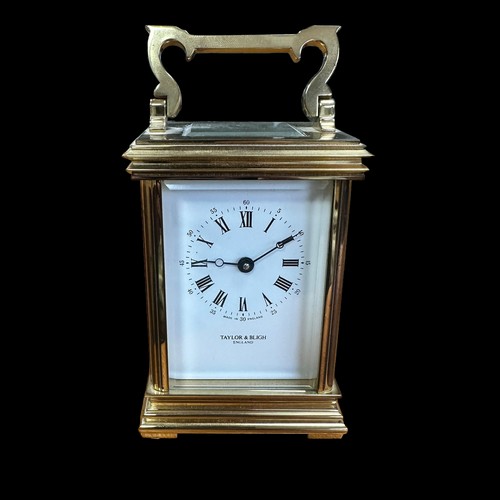 162 - Traylor & Bligh, pair of lacquered brass carriage clocks by Taylor & Bligh. Heights 15cm. (2)