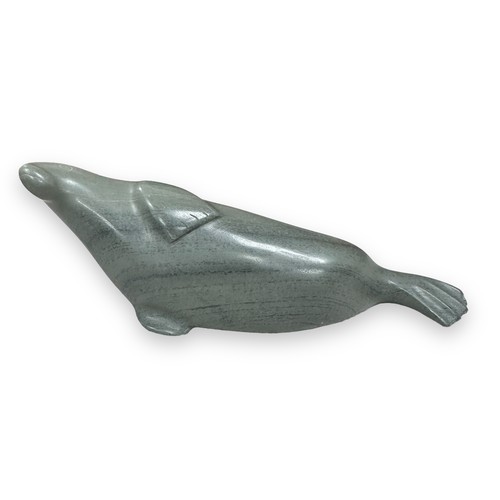 318 - Inuit soapstone carvings, to include; two seals one by Alice Mikiyuk (b.1926), and a polar bear by T... 