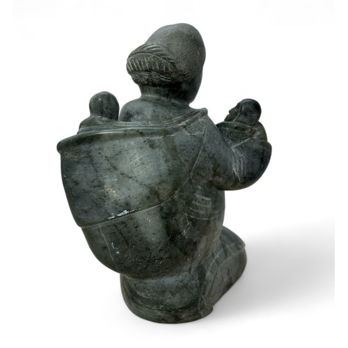 321 - Samson Nastapoka (Inuit, b.1931), large heavy Inuit stone carving of a mother holding her children. ... 