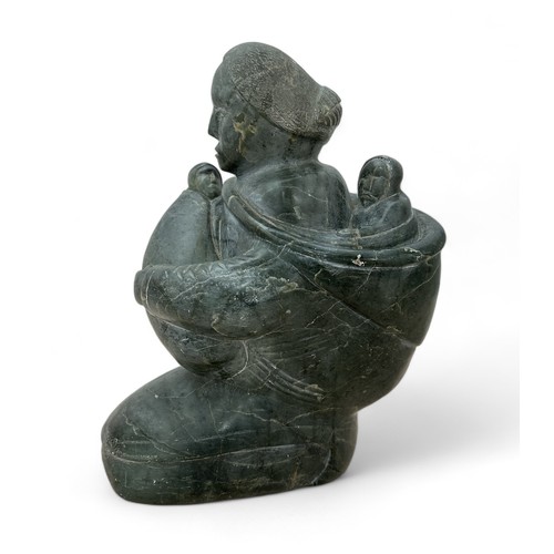 321 - Samson Nastapoka (Inuit, b.1931), large heavy Inuit stone carving of a mother holding her children. ... 