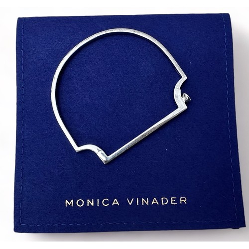 76 - A Monica Vinader 'Signature Skinny' silver bangle. With box and pouch.  Bracelet length 5.4cm, width... 