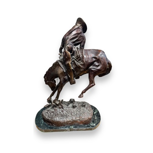 381 - After Frederic Remington (American, 1861-1909), ‘Rattlesnake’,  large bronze of a cowboy on horsebac... 