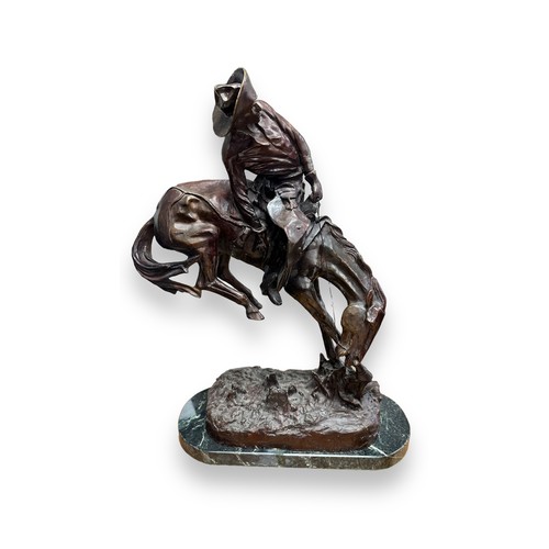 381 - After Frederic Remington (American, 1861-1909), ‘Rattlesnake’,  large bronze of a cowboy on horsebac... 