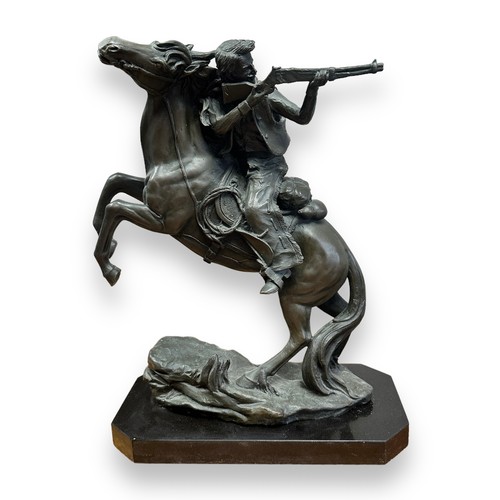 383 - Contemporary bronze effect sculpture of a Gunman on horseback, signed to mould Kamiko. Height 40cm.