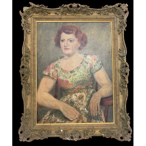 447 - 19th / 20th Century competent oil on canvas of a seated lady in floral dress. Indistinct pencil mark... 