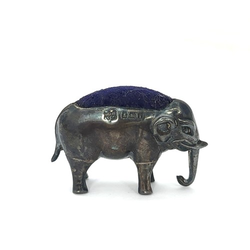 143 - An Edwardian silver pin cushion in the form of an elephant by W J Myatt & Co, Birmingham 1908. Lengt... 