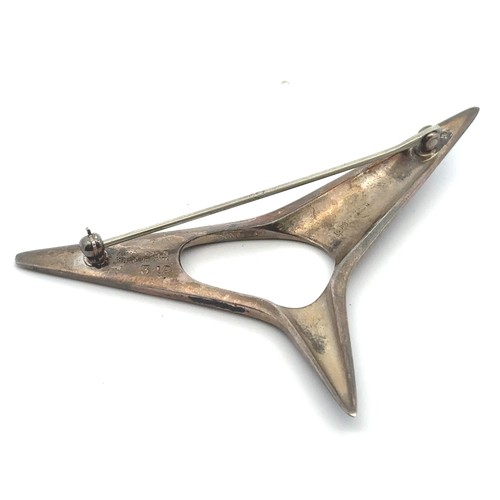 80 - A Danish silver Georg Jensen Brooch of stylised star form, designed by Henning Koppel  pattern No. 3... 