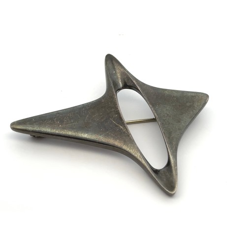 81 - A Danish silver Georg Jensen abstract star brooch, designed by Henning Koppel, pattern No. 339. Mark... 