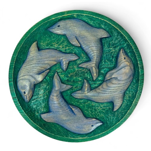 340 - Round carved studio woodwork Dolphin pattern decorative plaque, stamped JCT to reverse. Diameter 33c... 