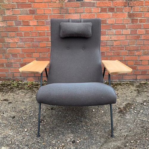 375 - Robin Day (British, 1915-2010), Recliner Chair, broad oak table style arm rests on iron frame, desig... 