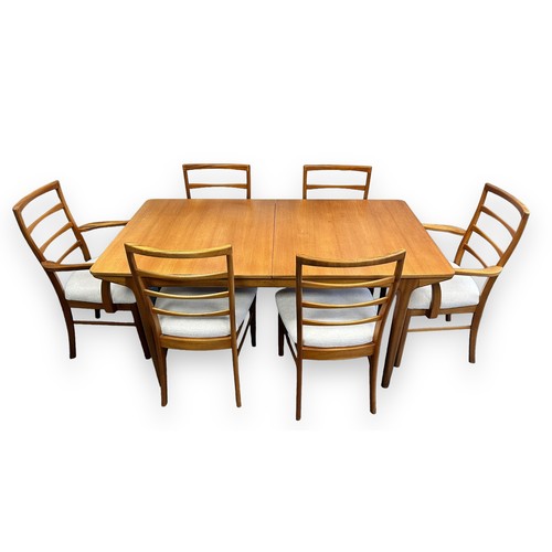 474 - A McIntosh mid-Century teak extending dining table with 6 chairs (2 bring carvers). Width 91cm, heig... 