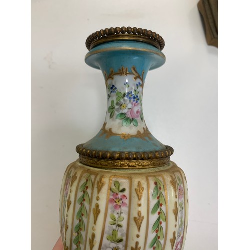 297 - Pair of  Sèvres vases with blue celeste ground and polychrome decorated with polychrome and gilt flo... 