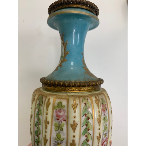 297 - Pair of  Sèvres vases with blue celeste ground and polychrome decorated with polychrome and gilt flo... 