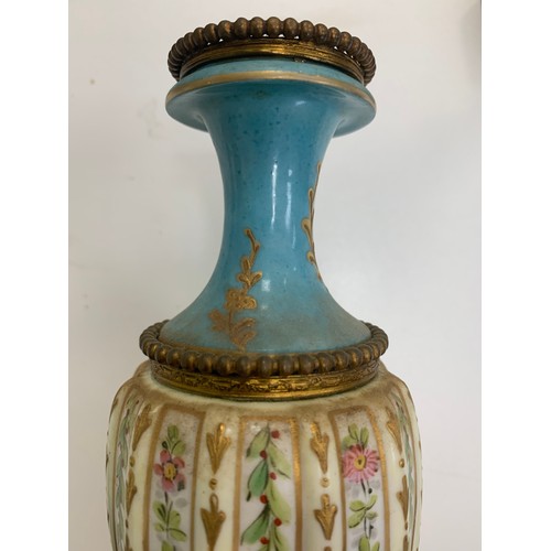 297 - Pair of  Sèvres vases with blue celeste ground and polychrome decorated with polychrome and gilt flo... 