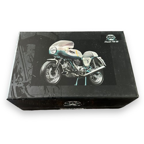 294 - Minichamps 1/12th scale 1977 Ducati 750 SS Silver/Blue (Classic Bike series No. 75), generally excel... 