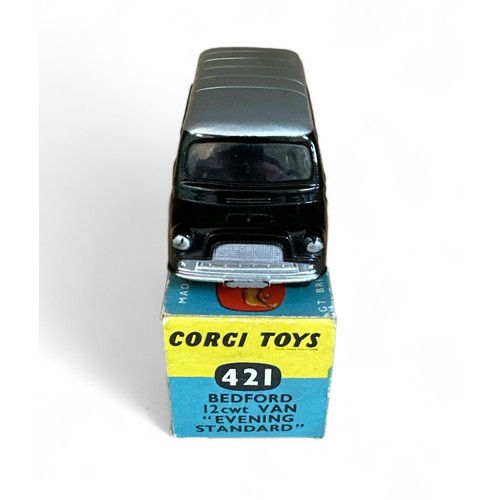 173 - Corgi No. 421 Bedford Evening Standard Delivery Van, black with silver roof, flat spun hubs, paper E... 