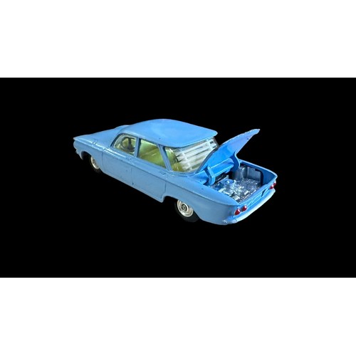 82 - Corgi Chevrolet Corvair No. 229, pale blue with lemon interior, generally excellent in good plus box... 