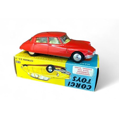 65 - Corgi Citroen DS19 No. 210S, red with lemon interior, flat spun hubs, generally excellent in good pl... 