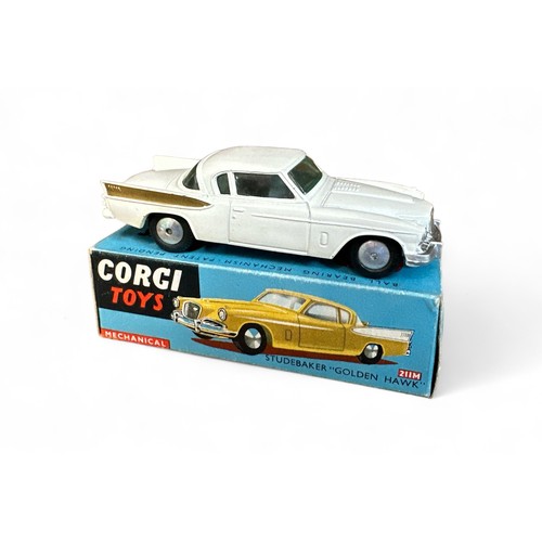 67 - Corgi Studebaker Golden Hawk No. 211M, white with gold rear wing flashes, flat spun hubs, folded col... 