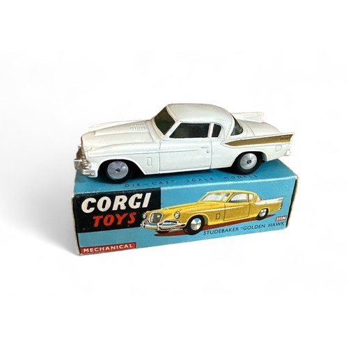 67 - Corgi Studebaker Golden Hawk No. 211M, white with gold rear wing flashes, flat spun hubs, folded col... 