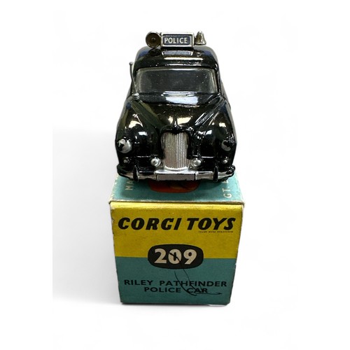 63 - Corgi Riley Pathfinder Police No. 209, black with aerial and Police roof box, flat spun hubs, genera... 