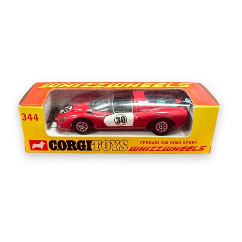 140 - Corgi Ferrari 206 Dino Sport No. 344, red with black interior, generally excellent (some staining to... 