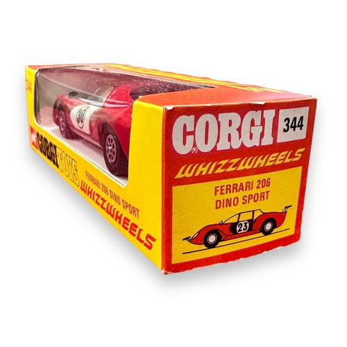 140 - Corgi Ferrari 206 Dino Sport No. 344, red with black interior, generally excellent (some staining to... 