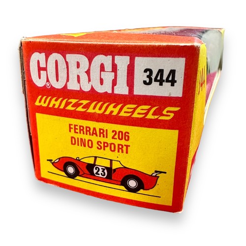 140 - Corgi Ferrari 206 Dino Sport No. 344, red with black interior, generally excellent (some staining to... 