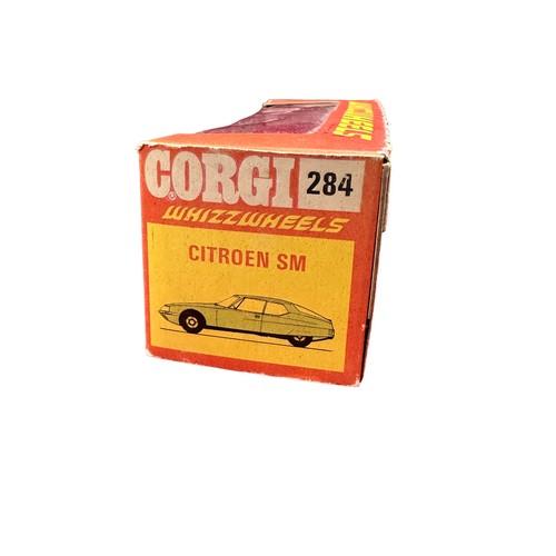 116 - Corgi Citroen SM No. 284, cerise with pale blue interior, cast-style Whizzwheel hubs, generally exce... 