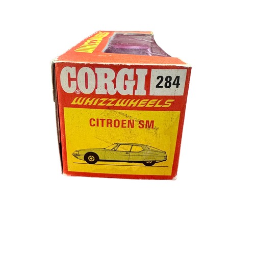 116 - Corgi Citroen SM No. 284, cerise with pale blue interior, cast-style Whizzwheel hubs, generally exce... 