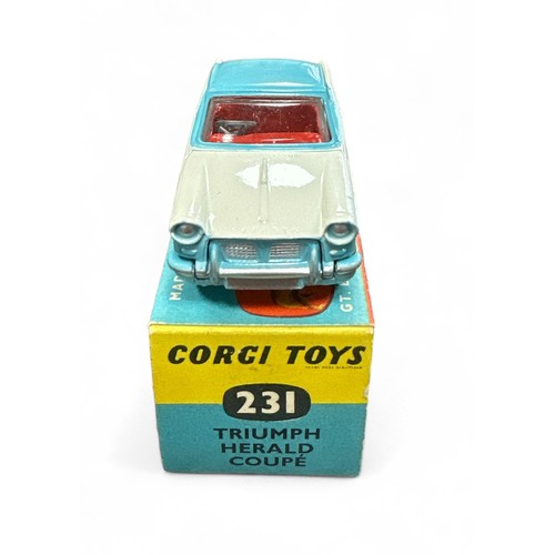 85 - Corgi Triumph Herald  No. 231, two-tone pale blue and white, generally excellent in good plus blue a... 