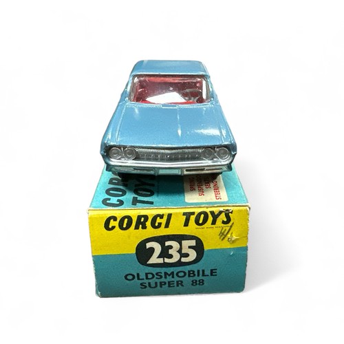 91 - Corgi Oldsmobile Super 88 No. 235, generally excellent in good plus box, metallic blue with red inte... 