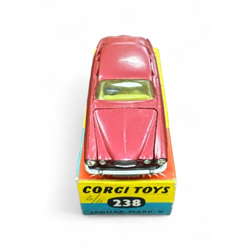 92 - Corgi Jaguar Mk X No. 238, generally excellent in good plus box with folded leaflet, metallic cerise... 