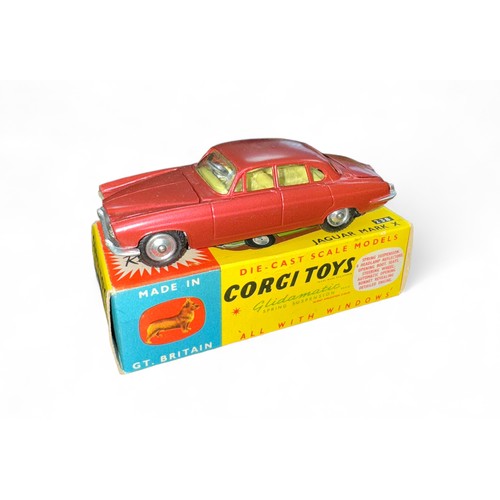 92 - Corgi Jaguar Mk X No. 238, generally excellent in good plus box with folded leaflet, metallic cerise... 