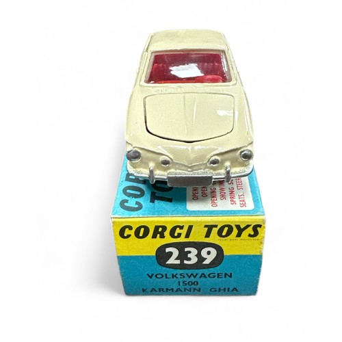 95 - Corgi No. 239 Volkswagen 1500 Karmann Ghia,  cream with red interior, spare wheel, small suitcase an... 