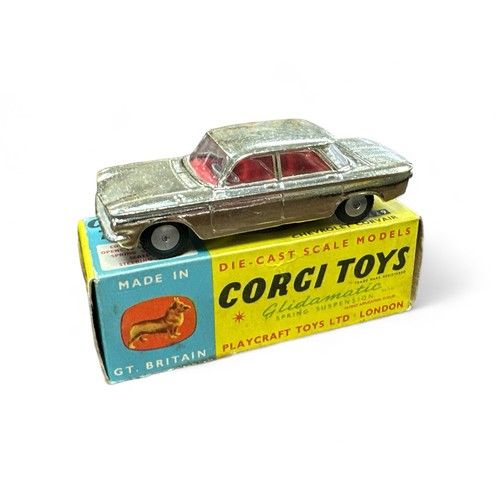 83 - Corgi Chevrolet Corvair No. 229, gold plated finish, red interior and flat hubs, generally excellent... 