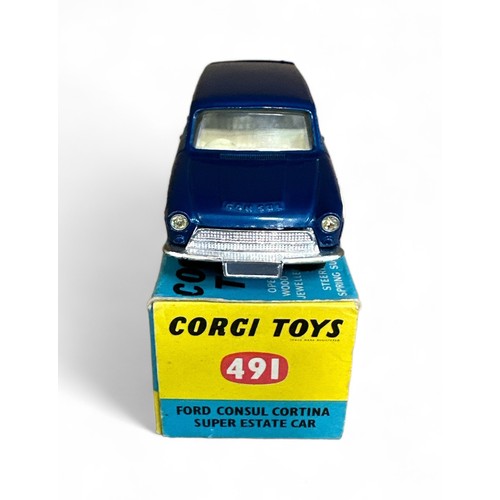 206 - Corgi Ford Consul Cortina No. 491, metallic blue with plastic wood side panels, excellent in good pl... 