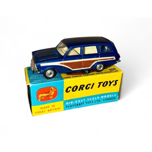 206 - Corgi Ford Consul Cortina No. 491, metallic blue with plastic wood side panels, excellent in good pl... 