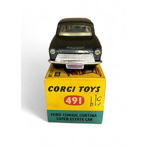 207 - Corgi Ford Consul Cortina No. 491, metallic grey with plastic wood side panels, excellent in good pl... 